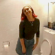 A talkative, giggly, redhead girl decides to neglect her toilet and shit in her panties instead. She laughs through the entire scene.